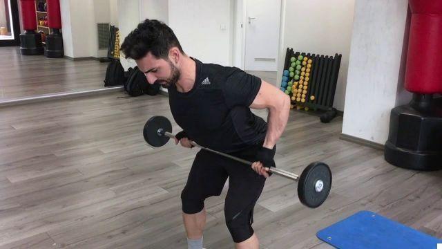 Rows with prone grip barbell