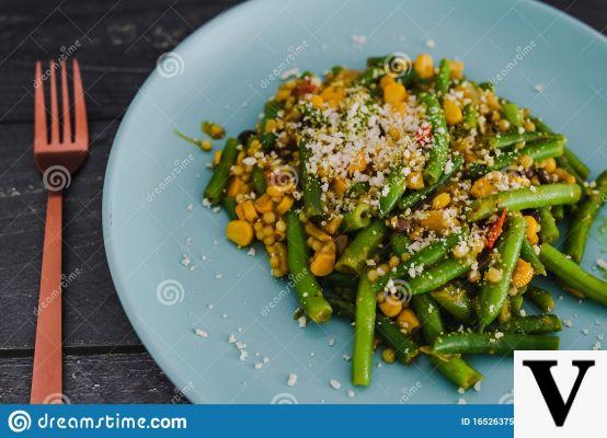 Vegan couscous with coral green beans and turmeric